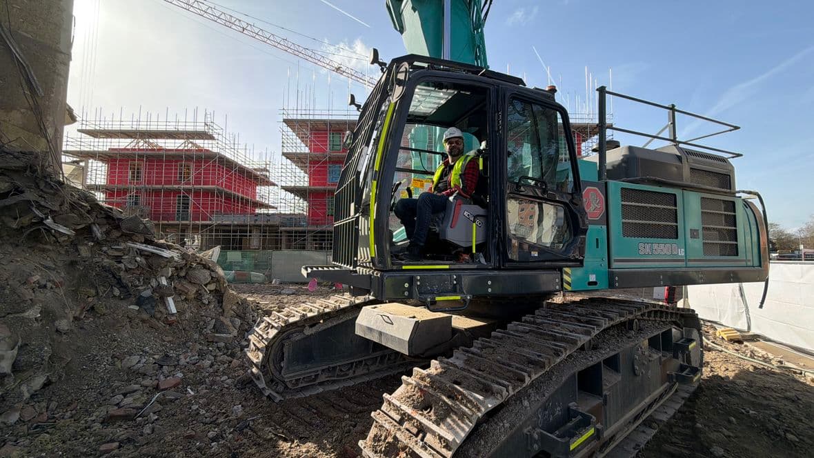 Nik rides in digger (Winwood)